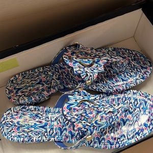 Crown and Ivy sandals with pink, blue, and white design